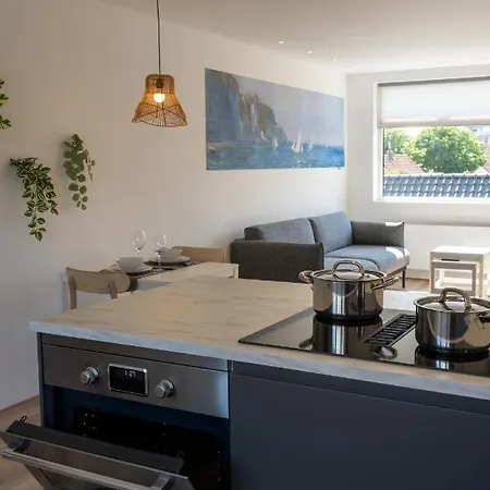 Aan Zee Апартаменты